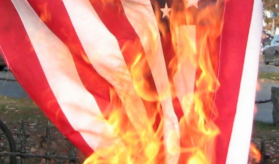 Fedex stands behind driver caught on viral video stopping protesters from burning American flag
