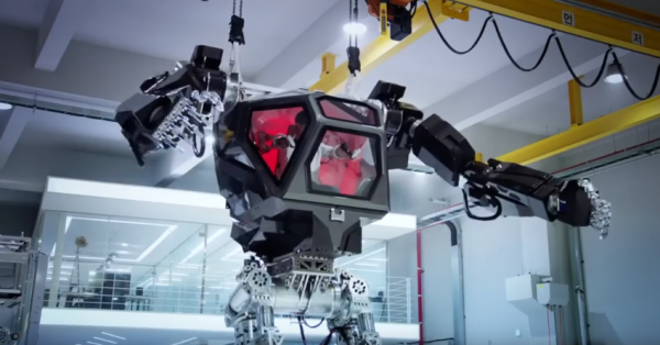 Giant terrifying 13 ft avatar robot controlled by human pilot, walks and moves like humans