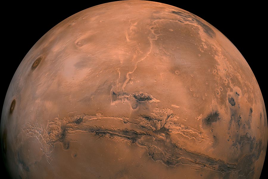 Trump signs NASA funding bill, hopes to send humans to Mars