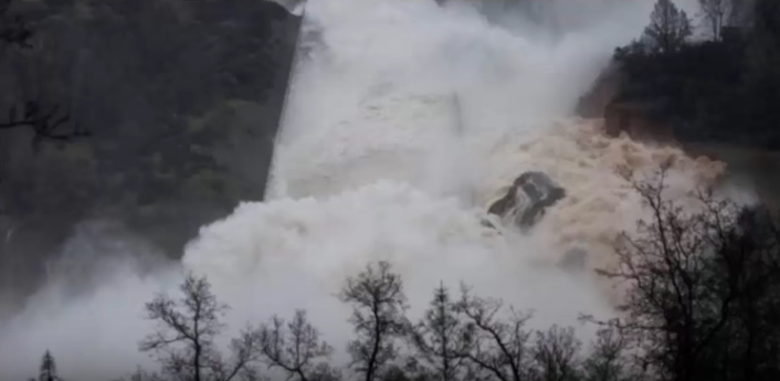 Government THEATER on parade in California as helicopters drop useless bags of rocks onto failing Oroville dam for the TV cameras