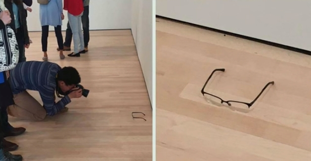 Trendy morons mistake glasses on the floor for elite ‘art’ in an art museum… people are now dumber than animals