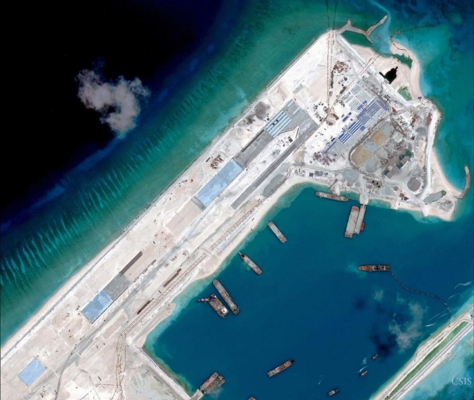 China lands plane on fake island; experts believe fighters, bombers will be next